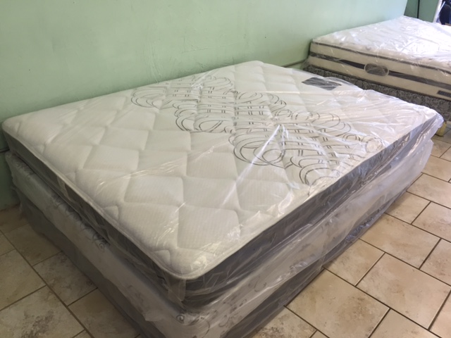 New queen plush mattress set only $299.