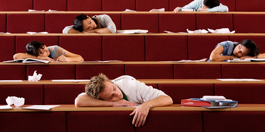 Students sleeping in lecture theatre